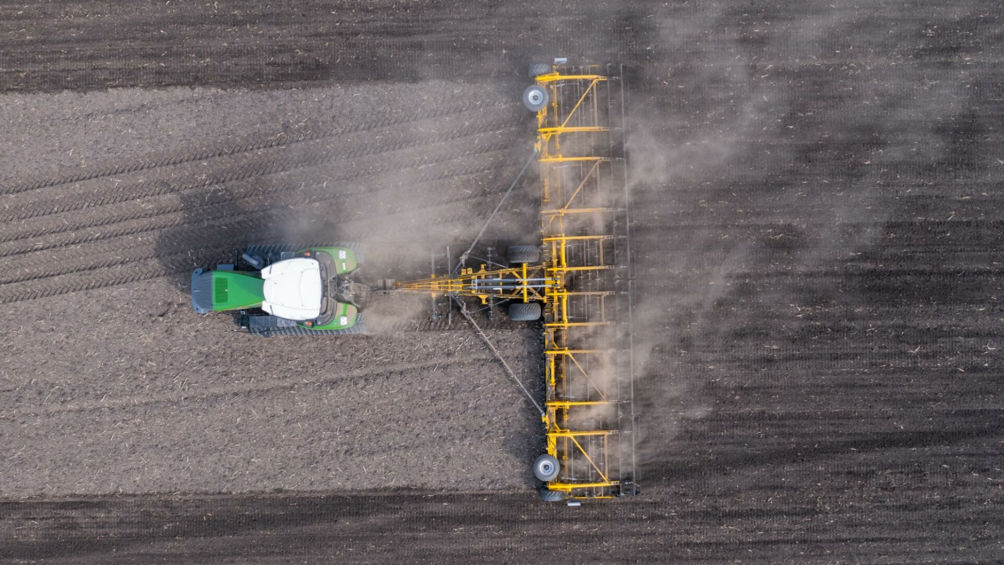 Working on a field spring planting seeding Ukraine